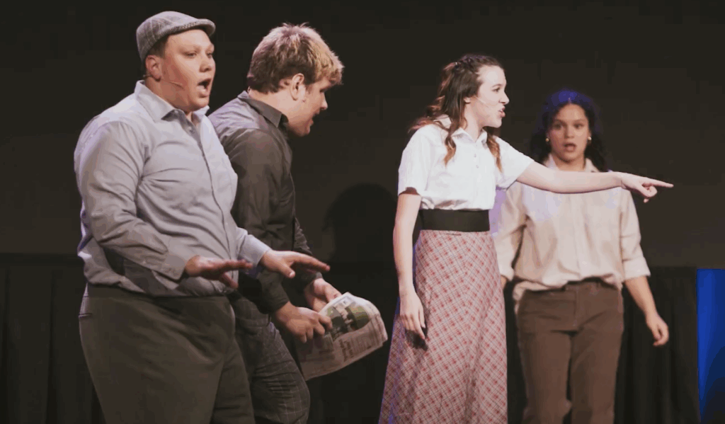 Students acting in the More production put on by the theatre program