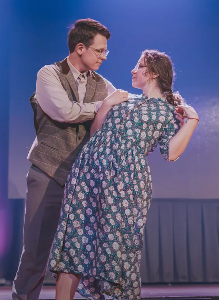 Students acting in the More production put on by the theatre program